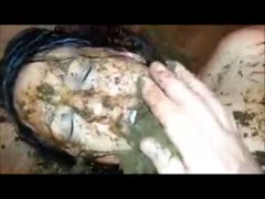 A man putting foul excrement in a girl's mouth and pussy